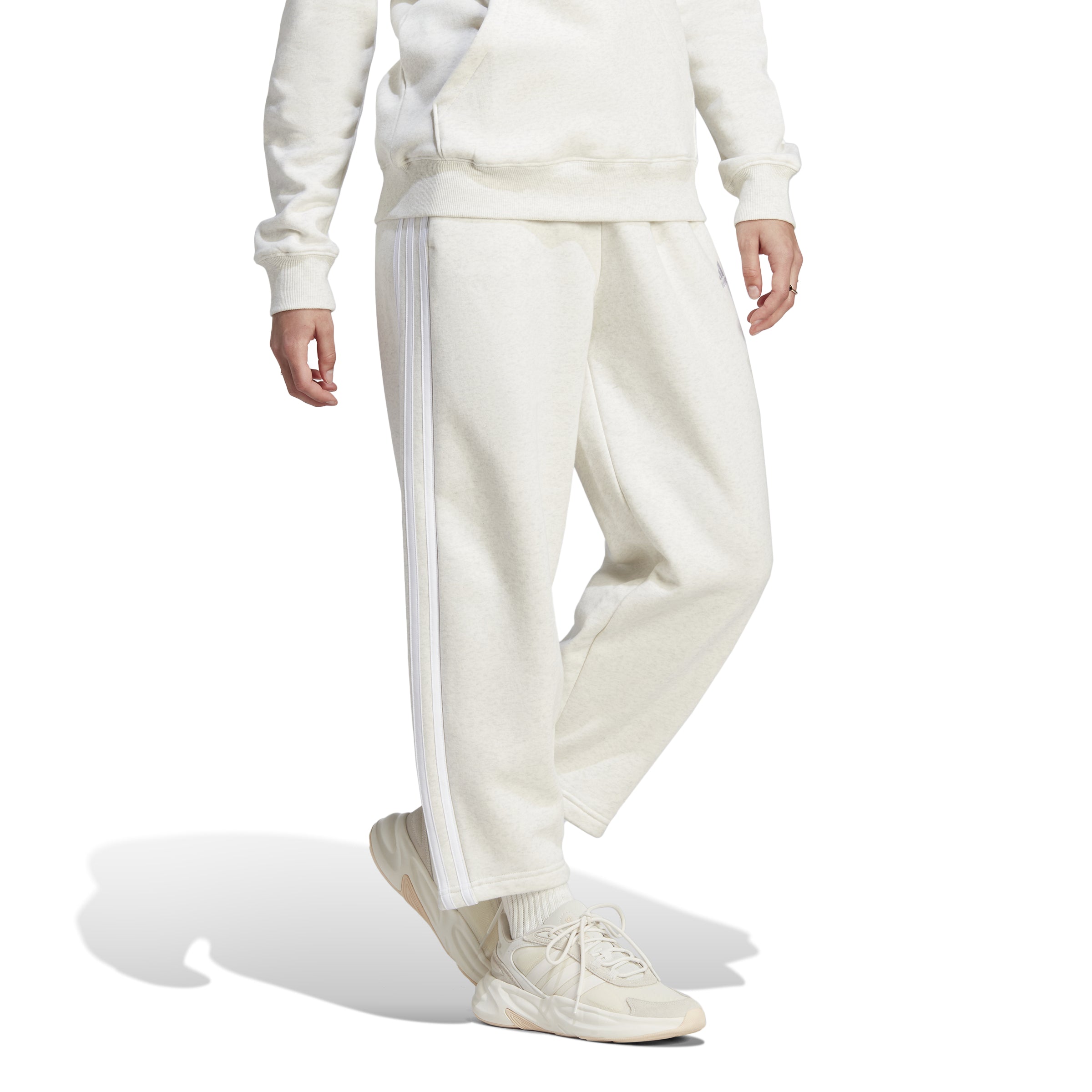 http://www.esportingedge.com/cdn/shop/files/Women-s-Adidas-Essentials-3-Stripes-Open-Hem-Fleece-Pant_OFFWHITE_1.jpg?v=1692628949